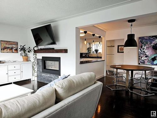 9535 148 St Nw, Edmonton, AB - Indoor Photo Showing Living Room With Fireplace