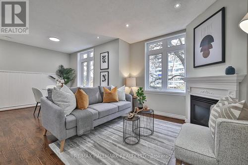 15 - 83 Lillian Street, Toronto, ON - Indoor Photo Showing Living Room With Fireplace