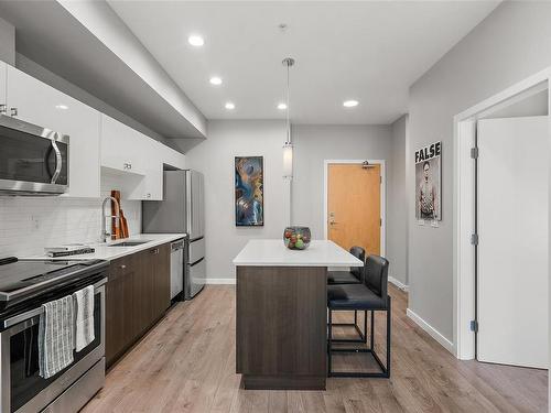 204-767 Tyee Rd, Victoria, BC - Indoor Photo Showing Kitchen With Stainless Steel Kitchen With Upgraded Kitchen