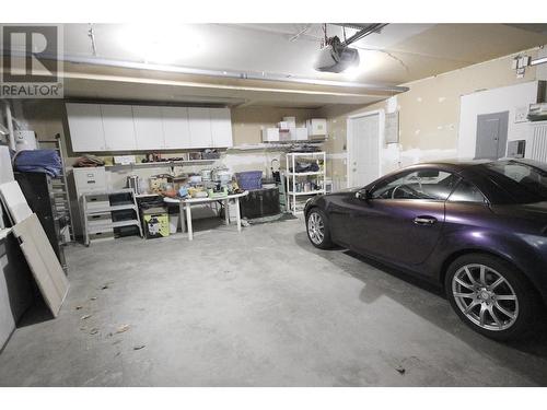 Double Car Garage - 555 San Ang Way, Princeton, BC - Indoor Photo Showing Garage