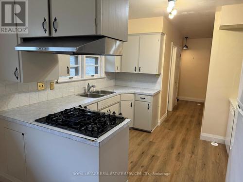 Mainflr - 508 Walkers Line, Burlington, ON - Indoor Photo Showing Kitchen With Double Sink