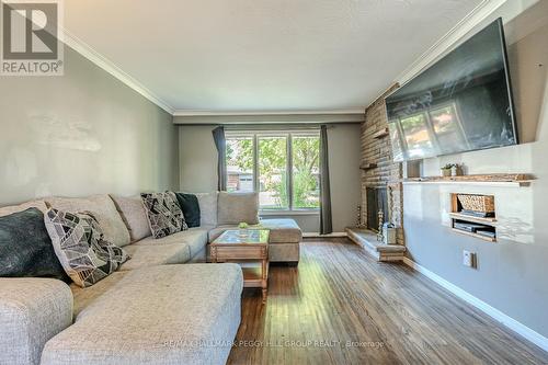 7 Alexander Avenue, Barrie, ON - Indoor Photo Showing Living Room With Fireplace