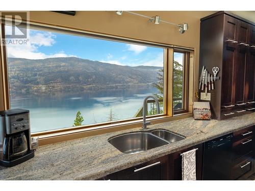 1238 Kyndree Court, Kelowna, BC -  Photo Showing Kitchen With Body Of Water With Double Sink