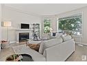 #203 8108 109 St Nw, Edmonton, AB  - Indoor Photo Showing Living Room With Fireplace 