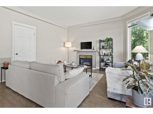 #203 8108 109 St Nw, Edmonton, AB - Indoor Photo Showing Living Room With Fireplace