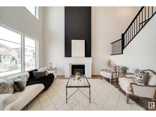 2035 165 St Sw, Edmonton, AB - Indoor Photo Showing Living Room With Fireplace