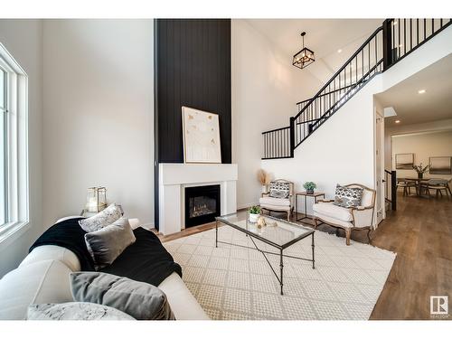 2035 165 St Sw, Edmonton, AB - Indoor Photo Showing Living Room With Fireplace