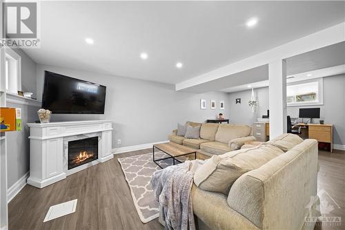 10 Mac Storey Street, Richmond, ON - Indoor Photo Showing Living Room With Fireplace