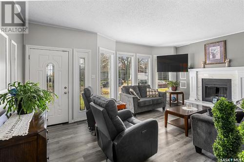 54 Henigman Place, Saskatoon, SK - Indoor Photo Showing Living Room With Fireplace