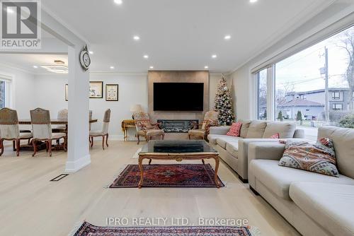 10 Urbandale Avenue, Toronto, ON - Indoor Photo Showing Living Room With Fireplace