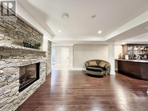 7 Cape George Trail, King, ON - Indoor Photo Showing Living Room With Fireplace