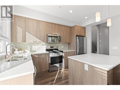 13098 Shoreline Way Unit# 26, Lake Country, BC - Indoor Photo Showing Kitchen With Stainless Steel Kitchen With Double Sink