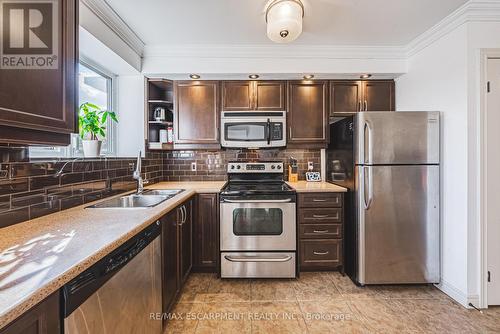 302 - 1212 Fennell Avenue E, Hamilton, ON - Indoor Photo Showing Kitchen With Stainless Steel Kitchen With Double Sink