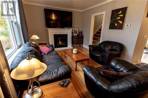 311 Fraser Street, Pembroke, ON - Indoor Photo Showing Living Room With Fireplace