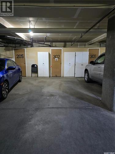 302 1172 103Rd Street, North Battleford, SK - Indoor Photo Showing Garage