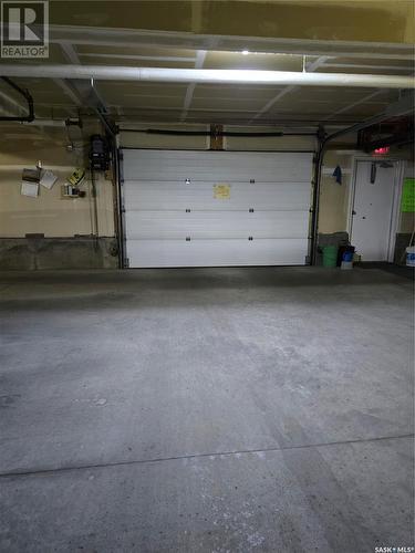 302 1172 103Rd Street, North Battleford, SK - Indoor Photo Showing Garage