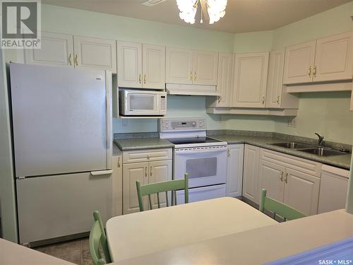 302 1172 103Rd Street, North Battleford, SK - Indoor Photo Showing Kitchen With Double Sink