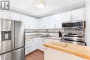 1105 Belfry Avenue Unit# 107, Sudbury, ON  - Indoor Photo Showing Kitchen With Double Sink 