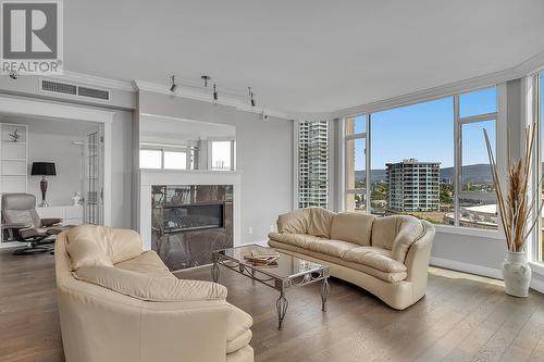 1152 Sunset Drive Unit# 1201, Kelowna, BC - Indoor Photo Showing Living Room With Fireplace