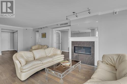 1152 Sunset Drive Unit# 1201, Kelowna, BC - Indoor Photo Showing Living Room With Fireplace