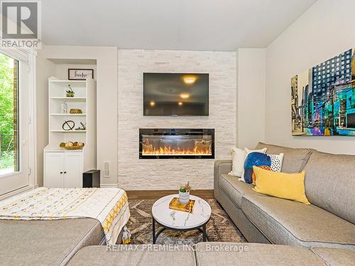 22 Great Heron Court, King, ON - Indoor Photo Showing Living Room With Fireplace