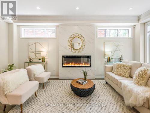 22 Great Heron Court, King, ON - Indoor Photo Showing Living Room With Fireplace