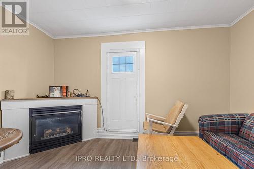 6501 Highway 93, Tay, ON - Indoor Photo Showing Living Room With Fireplace