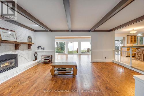 Open concept family room with gas fireplace - 3070 Sandpiper Trail, Plympton-Wyoming (Plympton Wyoming), ON - Indoor Photo Showing Living Room With Fireplace