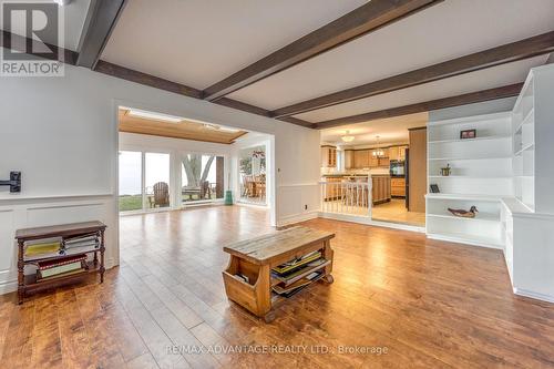 Family room with built in bookshelves - 3070 Sandpiper Trail, Plympton-Wyoming (Plympton Wyoming), ON - Indoor Photo Showing Living Room