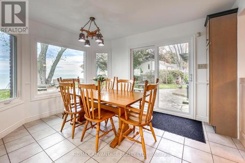 Eat in kitchen with lake view and walkout to patio - 3070 Sandpiper Trail, Plympton-Wyoming (Plympton Wyoming), ON - Indoor Photo Showing Dining Room