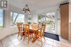 Eat in kitchen with lake view and walkout to patio - 