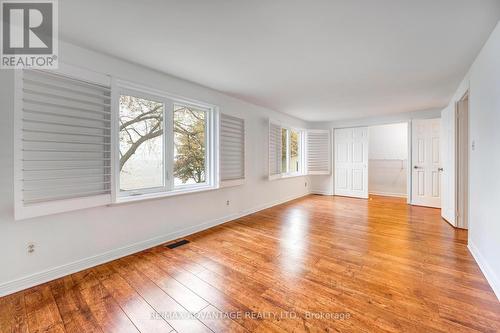 Expansive primary bedroom with lake views - 3070 Sandpiper Trail, Plympton-Wyoming (Plympton Wyoming), ON - Indoor Photo Showing Other Room