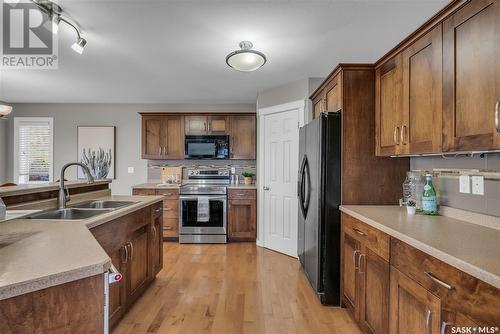 702 Lynd Crescent, Saskatoon, SK - Indoor Photo Showing Kitchen With Double Sink