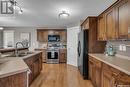 702 Lynd Crescent, Saskatoon, SK  - Indoor Photo Showing Kitchen With Double Sink 