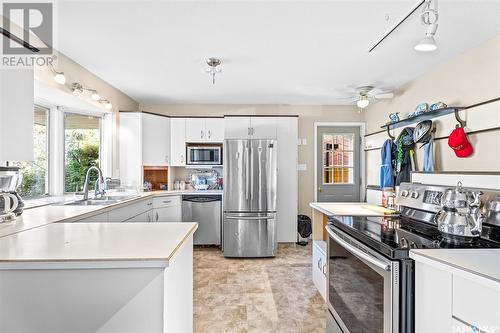 801 Keith Street, Moose Jaw, SK - Indoor Photo Showing Kitchen With Stainless Steel Kitchen With Double Sink