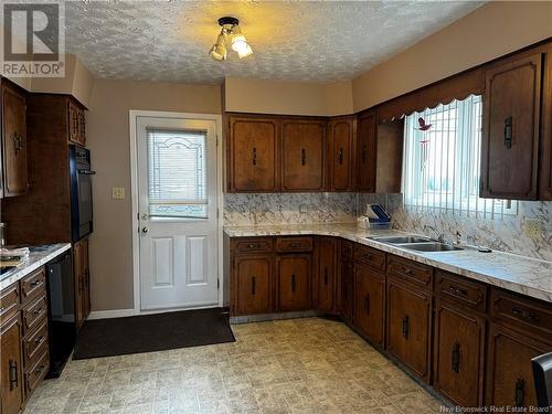 364 Du Pouvoir Road, Edmundston, NB - Indoor Photo Showing Kitchen With Double Sink