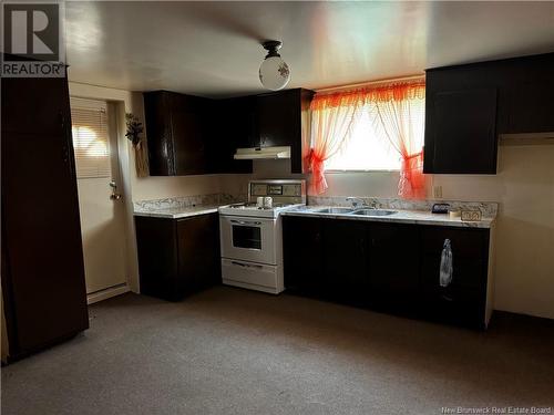 364 Du Pouvoir Road, Edmundston, NB - Indoor Photo Showing Kitchen With Double Sink