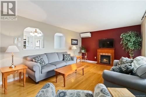 15 Hanbury Crescent, Moncton, NB - Indoor Photo Showing Living Room With Fireplace