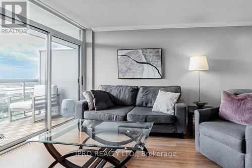 1224 - 18 Mondeo Drive, Toronto, ON - Indoor Photo Showing Living Room