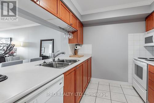 1224 - 18 Mondeo Drive, Toronto, ON - Indoor Photo Showing Kitchen With Double Sink