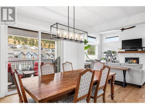 1353 Myra Place, Kamloops, BC - Indoor Photo Showing Dining Room With Fireplace