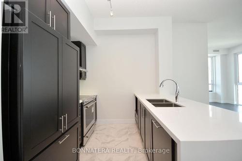 Lph3 - 4055 Parkside Village Drive, Mississauga, ON - Indoor Photo Showing Kitchen With Double Sink