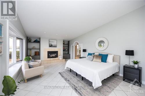 1104 Boucher Crescent, Ottawa, ON - Indoor Photo Showing Bedroom With Fireplace