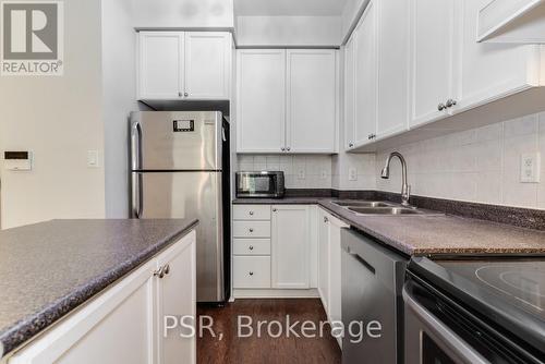 208 - 3880 Duke Of York Boulevard, Mississauga, ON - Indoor Photo Showing Kitchen With Double Sink