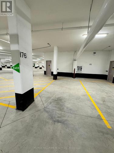 215 - 395 Dundas Street, Oakville, ON - Indoor Photo Showing Garage