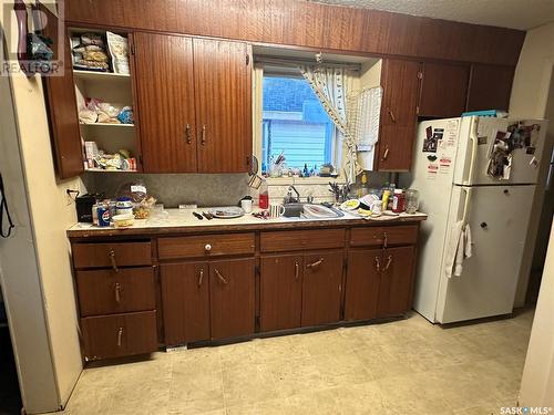 1937 14Th Street W, Prince Albert, SK - Indoor Photo Showing Kitchen With Double Sink