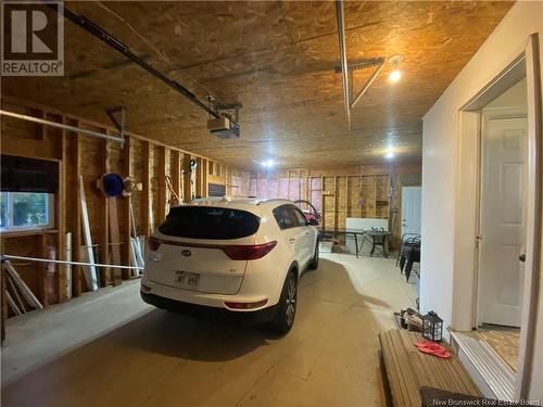 211 Foulem, Beresford, NB - Indoor Photo Showing Garage