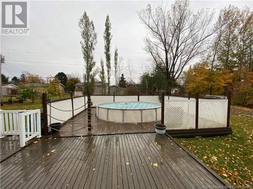 211 Foulem, Beresford, NB - Outdoor With Above Ground Pool