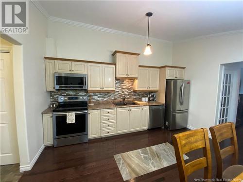 211 Foulem, Beresford, NB - Indoor Photo Showing Kitchen With Double Sink