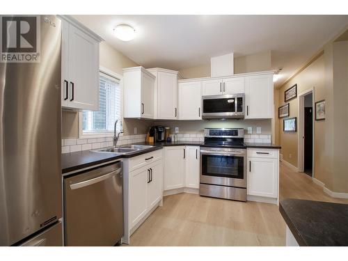 1442 Illecillewaet Road Unit# 5, Revelstoke, BC - Indoor Photo Showing Kitchen With Double Sink